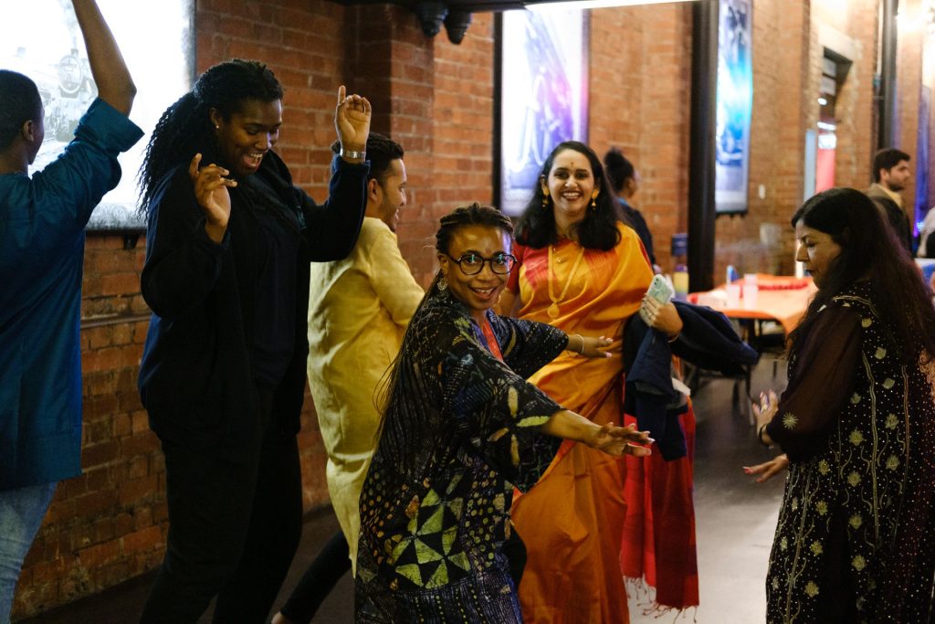 People celebrating diwali in the engine shed